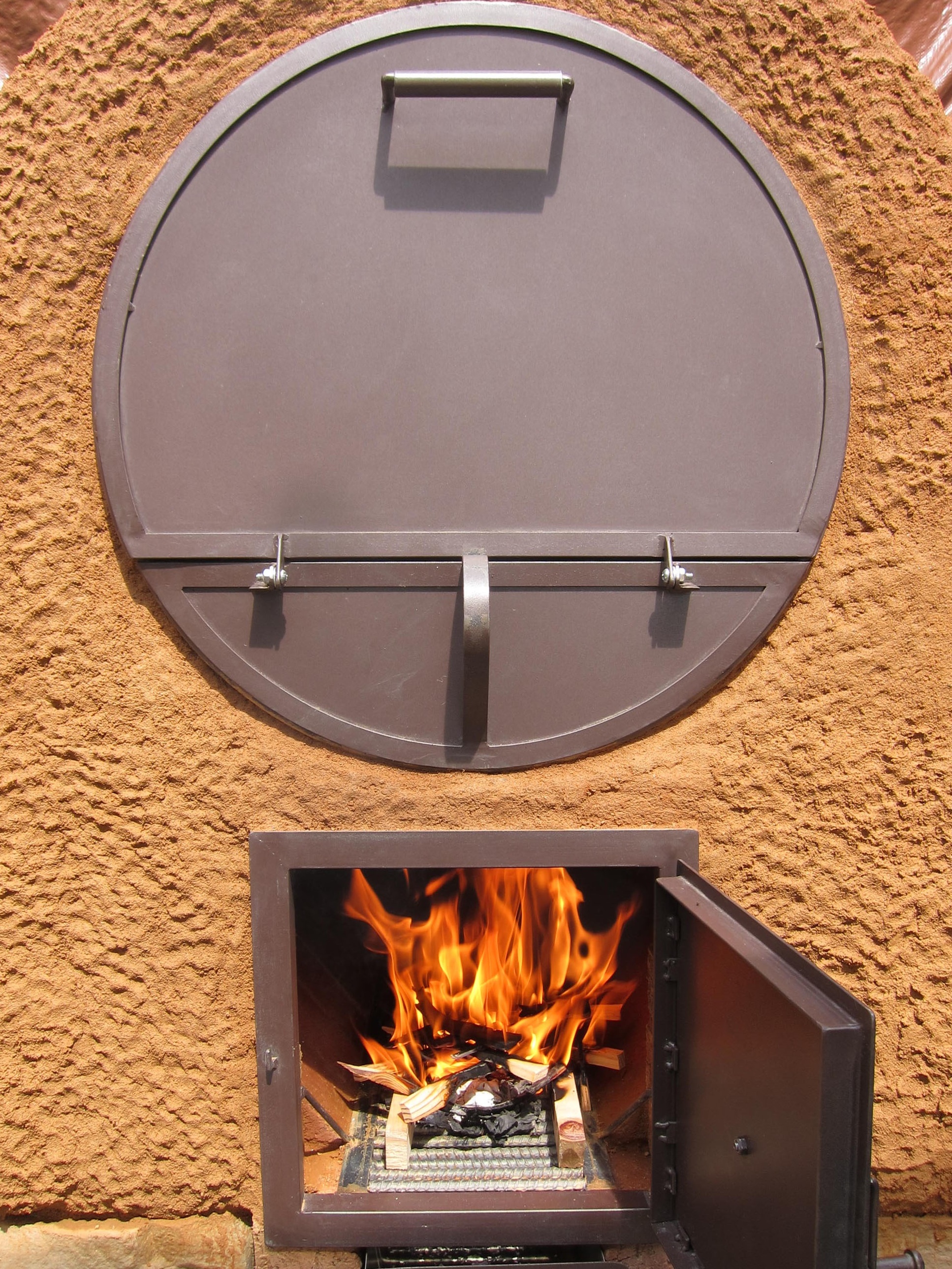 http://www.handprintpress.com/wp-content/uploads/2012/11/barrel-oven-see-the-fire.jpg